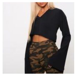 Black v neck cropped top with flared sleeves